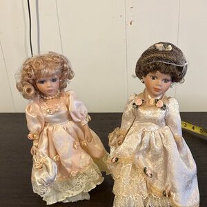 Elegant Porcelain Dolls in Lace Dresses